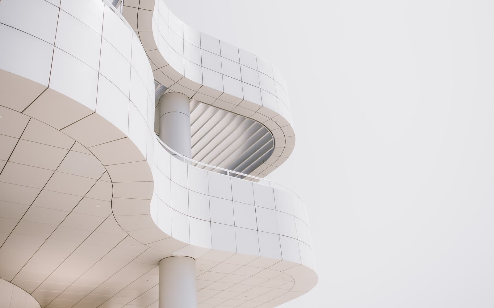 Curved white architectural facade